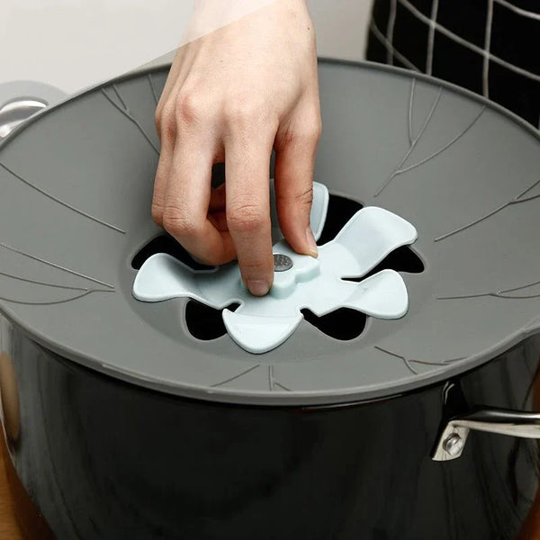 Multifunctional-Silicone-Lid-Spill-Stopper-Anti-Overflow-Pot-Cover-Kitchen-Gadgers-Cooking-Pot-Lids-Utensil.jpg